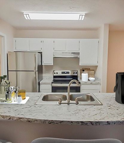 Cook and entertain in style with our contemporary kitchens, featuring sleek countertops, modern appliances, and ample cabinetry for all your culinary needs.