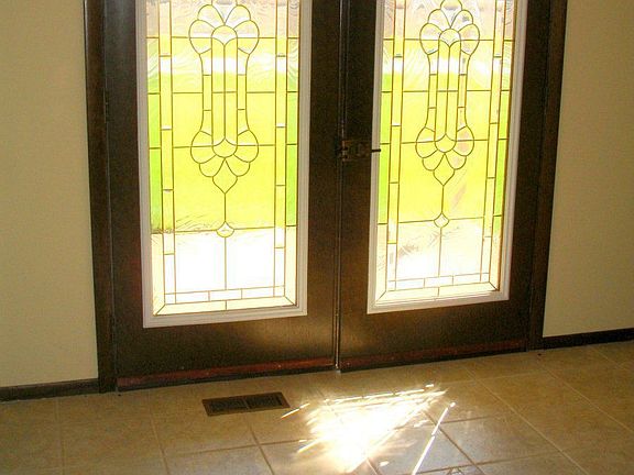 entering through this gorgeous leaded glass door 