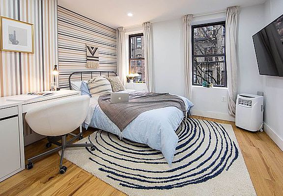 2nd image of 413 E 9th St APT 4A