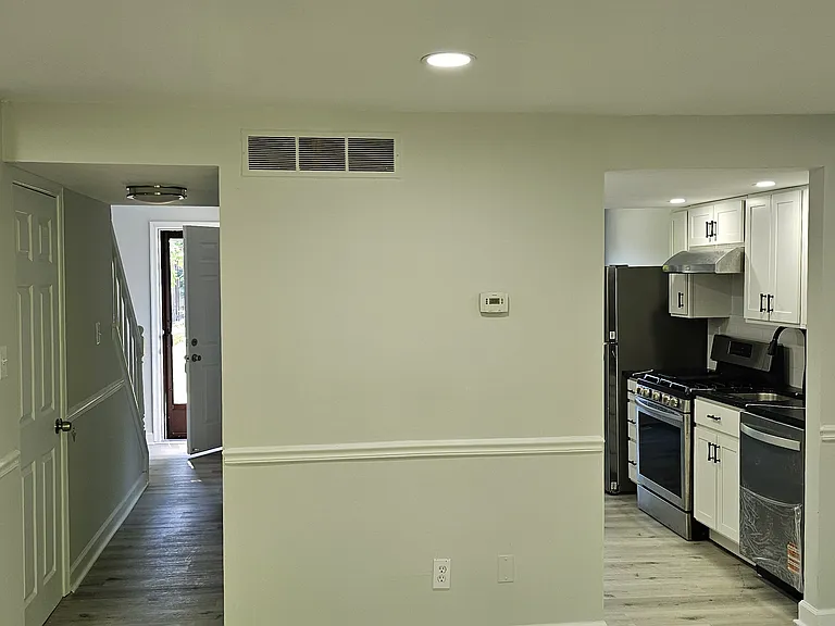 View of Kitchen and Entrance from Living room
