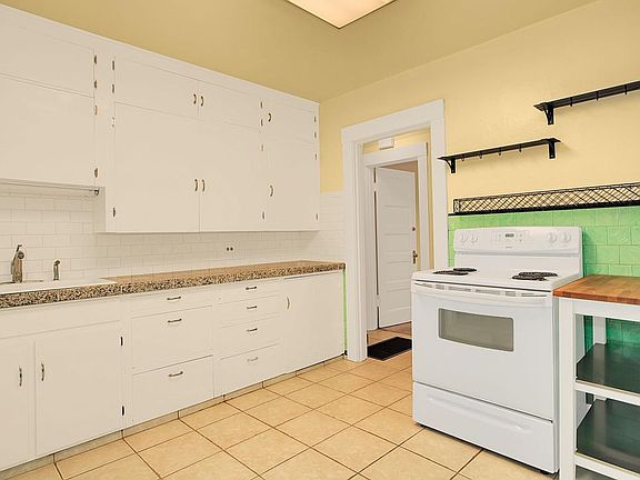 Updated vintage kitchen with granite tile counters