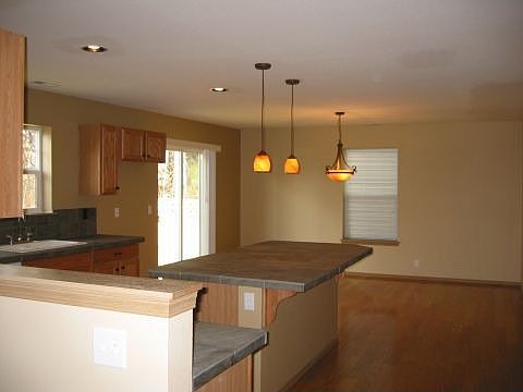 New hardwood floors and slate countertops