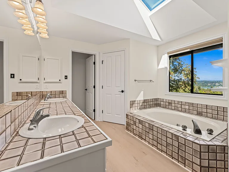 Master Bathroom with his and her walk-in closets and great view