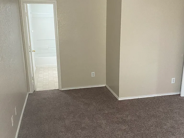Master Bedroom Leads to Large Master Bathroom