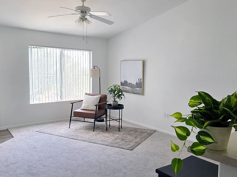 Enjoy a bright, open living room filled with natural light. Neutral finishes and a spacious layout create the perfect setting for relaxing, entertaining, or making yourself feel at home.