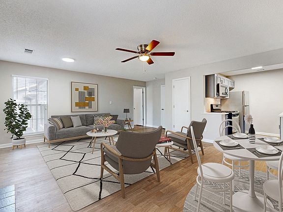 Open Living Floorplan with Wood-Inspired Plank Flooring