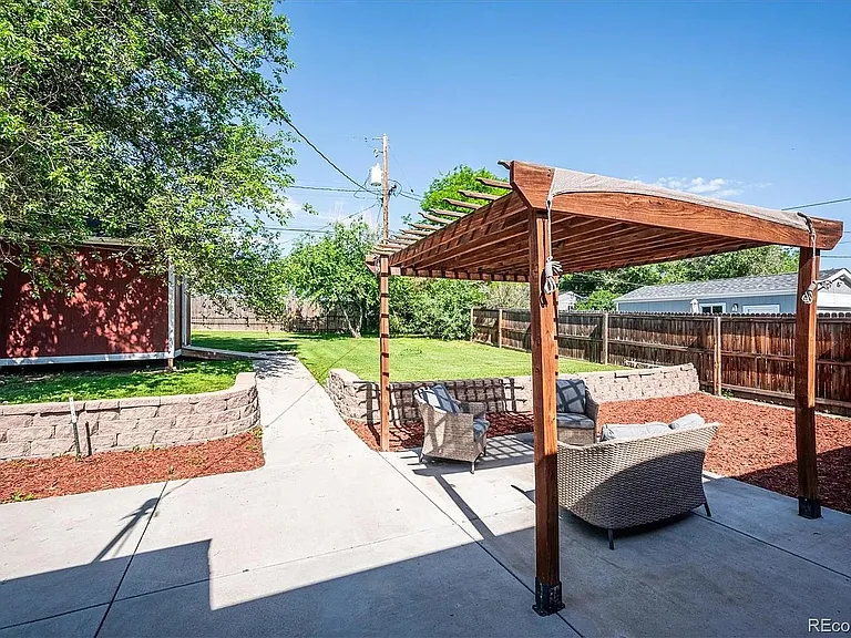 Backyard with pergola and shed