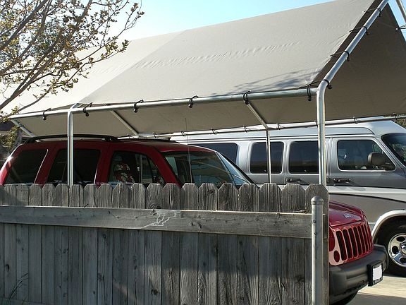 Covered carport in a 2 car driveway
