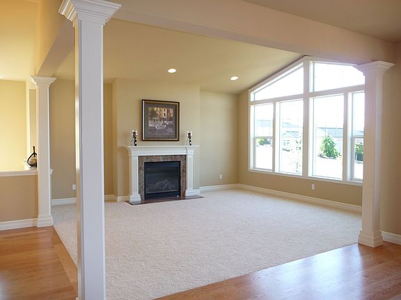 Great room has a vaulted ceiling.