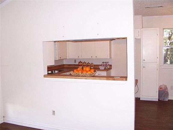 Pass through window from kitchen to family room.