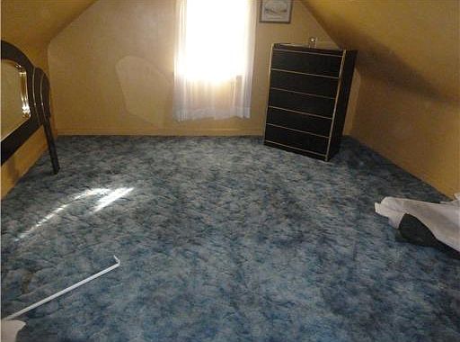 This bedroom has great lines with coved ceiling