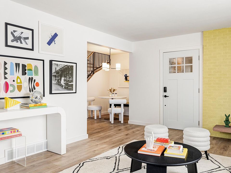 Living room with wood fireplace Front door enters into shared mudroom