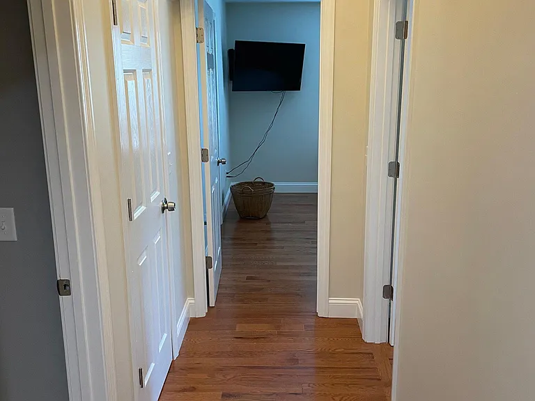 Upstairs main hallway that lead to three bedrooms