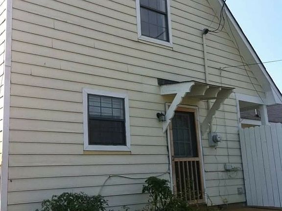 Back Entrance (with patio and herb garden)