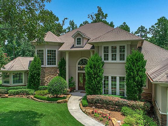 What a stunning welcoming entry for greeting your guest. Note: the beautiful stacked stone that surrounds the front of the home