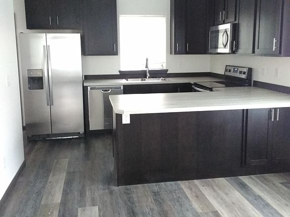 Kitchen, with space for additional counter seating