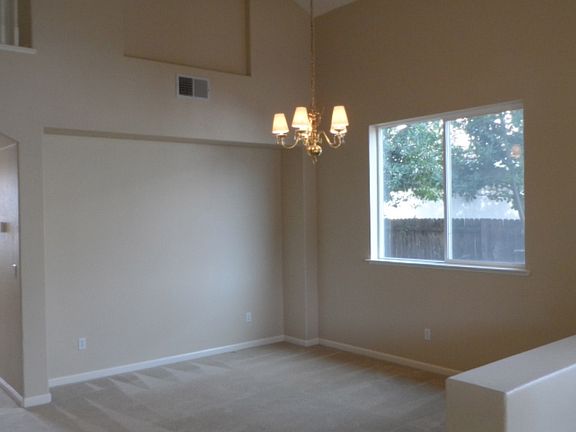 Dining Room w/ Vaulted Ceilings