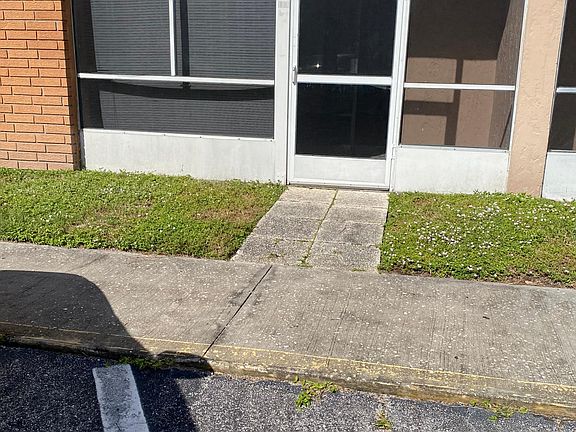 Can enter this lanai area in front of assigned parking
