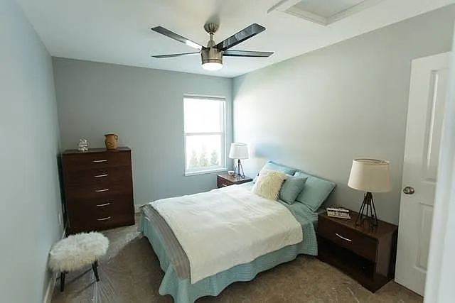 Comfortable bedroom with walk in closet