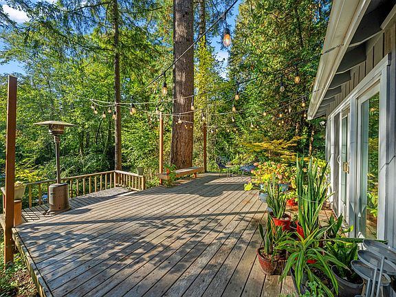 Front deck leading to french glass doors to living room