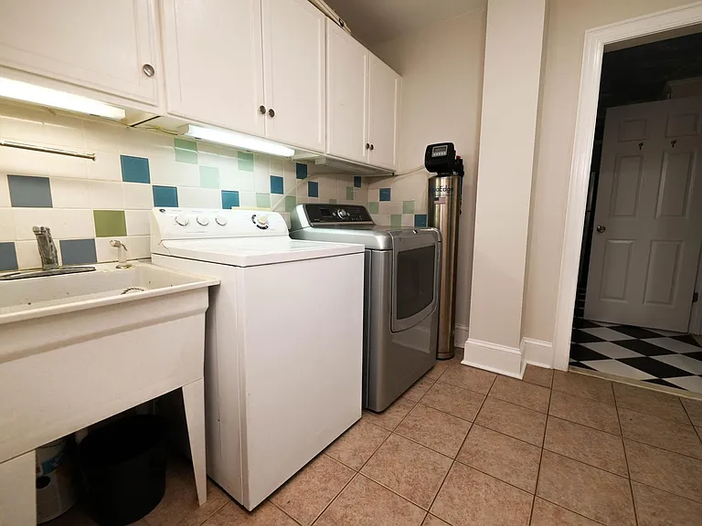 Laundry area with large sink