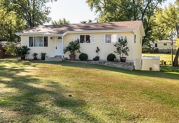 The roof, siding, windows, gutters, enclosed sofit and facia are all 7 yrs old.