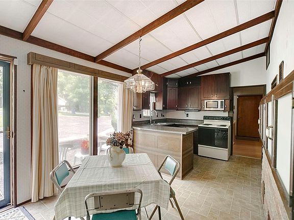 Bright and light is what you will find in this eat in kitchen area!
