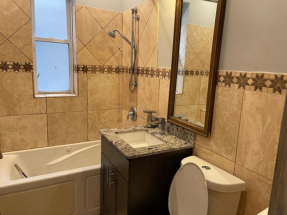 3rd image of 1238 S 58th Ave Unit 1
