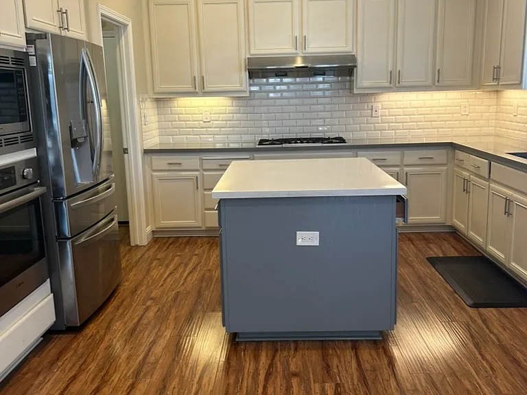 Kitchen, with island area, freshly painted interiors. Brand new refrigerator (6 months)