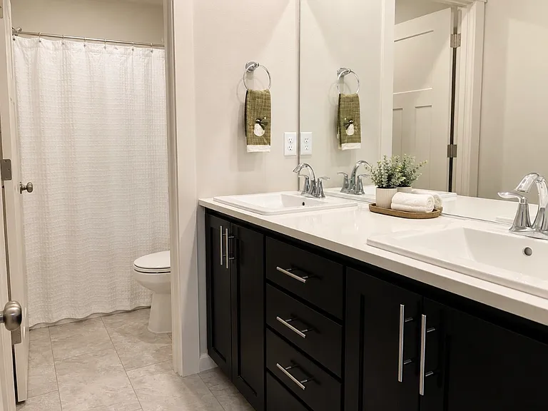 Upstairs bathroom near the bunk room. Shower and tub combo.