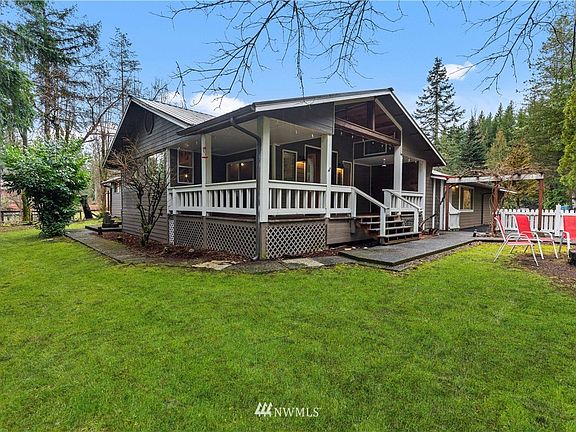 Main home welcomes you with the covered front porch.