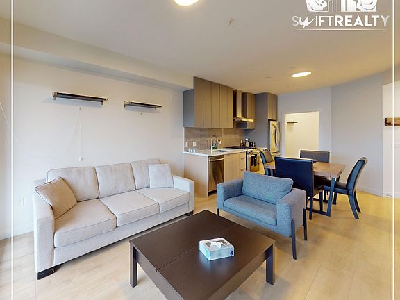 04_610-603 Regan Ave_Bright Living Room_04172025