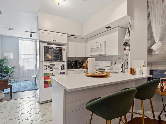 5th image of 224 48th St APT 4H