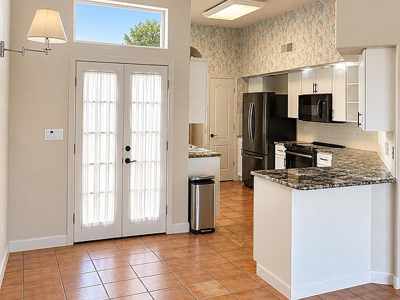4th image of 9208 Masini Ln NW