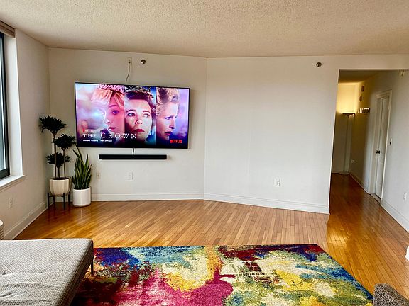 Wall pre set up to accommodate at least an 85" TV (As shown)