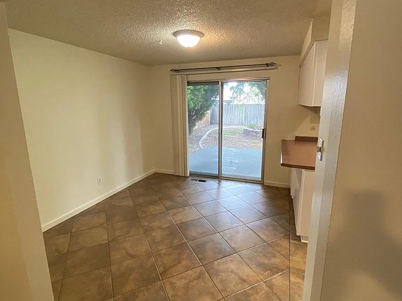 Dining Room off Kitchen and Living room. Backslider to deck