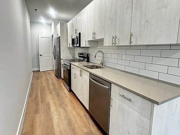2nd image of 1229 W Hilton St #3