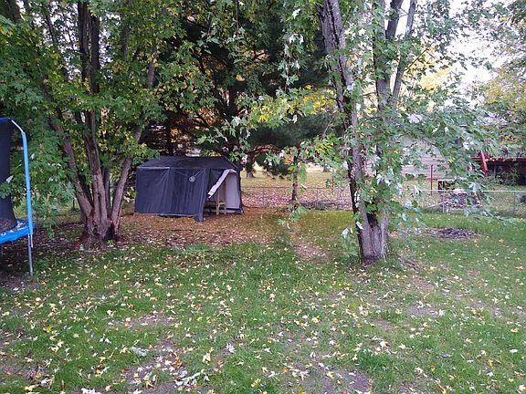 Shed in back yard fully fenced