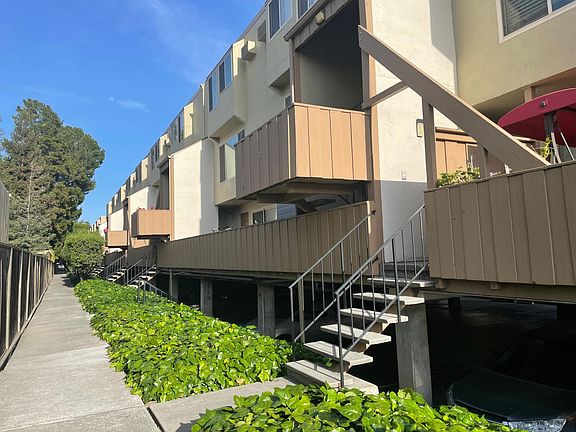 walkway on the left of building 320 to get to the unit