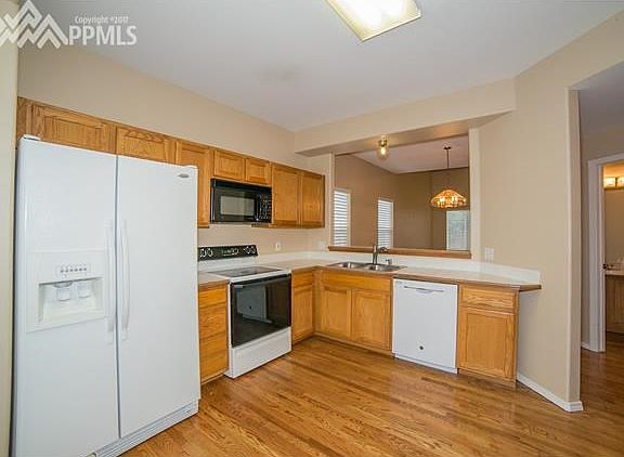 Kitchen with pass-thru to Dining Room.