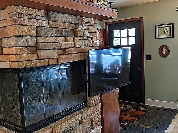 Entryway with fireplace