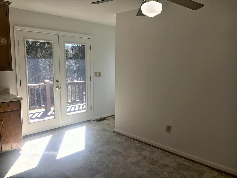 French doors leading to deck off kitchen