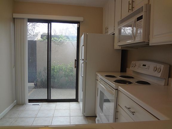 Kitchen with sliding glass door to front patio