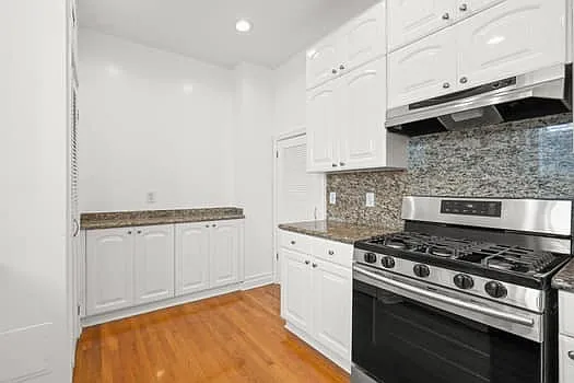 LARGE KITCHEN W/ TONS OF STORAGE AND COUNTERTOPS