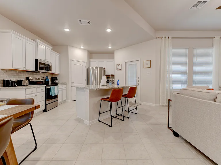 Feel right at home with a fully stocked kitchen_pots, pans, and all the essentials included