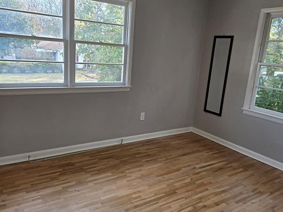 Front bedroom looking toward front of house. Touch up painting completed and paint supplies removed.