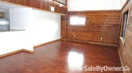 Roomy Great Room
						:
						New hardwood floors, eating bar with granite top.