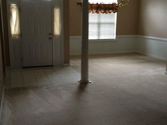 Front Door Entrance/Foyer and Dining Room Area