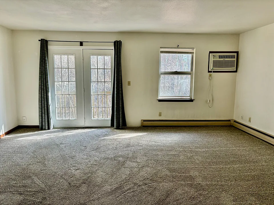 Living room with french doors to balcony