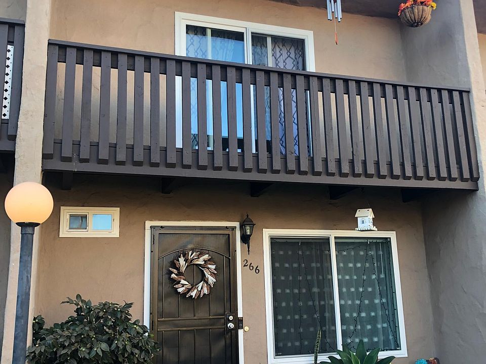 Front of property. Balcony and Master Bedroom up top.